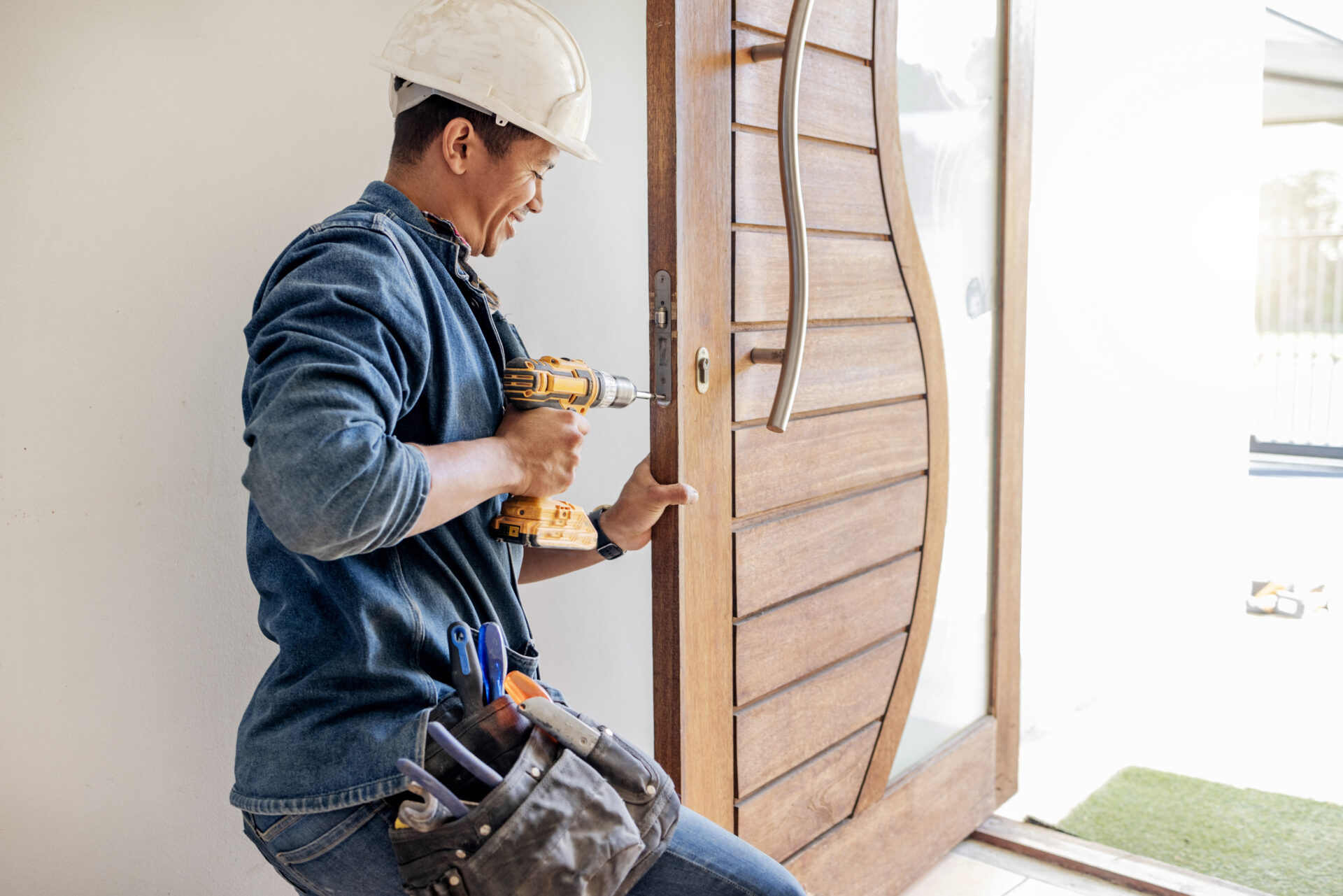 Man installing fire door